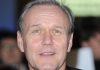 ‘Buffy,’ ‘Ted Lasso’ icon Anthony Stewart Head dies at 72 Close-up portrait of a smiling middle-aged man with gray hair and blue eyes, indoors.