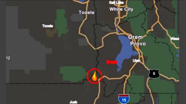 Map showing a wildfire icon near Juab, Utah, circled to indicate a fire along a highway south of Provo.
