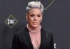 Tony Awards: Where to watch, what to expect Woman with short silver hair in a black blazer and pink ruffled blouse posing on the red carpet at the People’s Choice Awards.