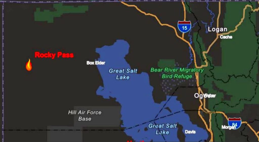 Map of the Great Salt Lake region showing Rocky Pass with a flame icon Bear River Migratory Bird Refuge Hill Air Force Base and nearby towns Logan Ogden Davis Morgan
