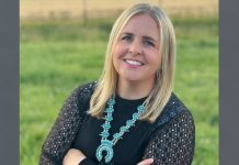 Gov. appoints new Great Salt Lake commissioner Smiling blonde woman outdoors in a grassy field, wearing a black lace top and turquoise necklace.