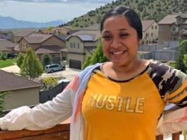 Tribute, fundraising account established for woman killed in I-215 Taylorsville collision Woman smiling on a wooden balcony overlooking a suburban neighborhood with houses and hills in the distance.